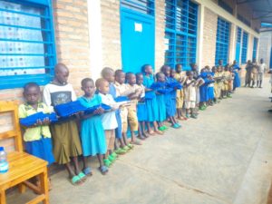 SCHOOL UNIFORM DISTRIBUTION PROJECT AT NKIMA PRIMARY SCHOOL, HUYE DISTRICT